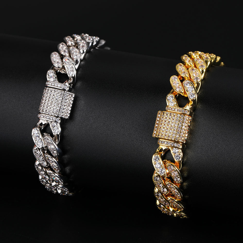 12MM SINGLE ROW ZIRCON CUBAN LINK BRACELET IN BLACK GOLD AND YELLOW GOLD