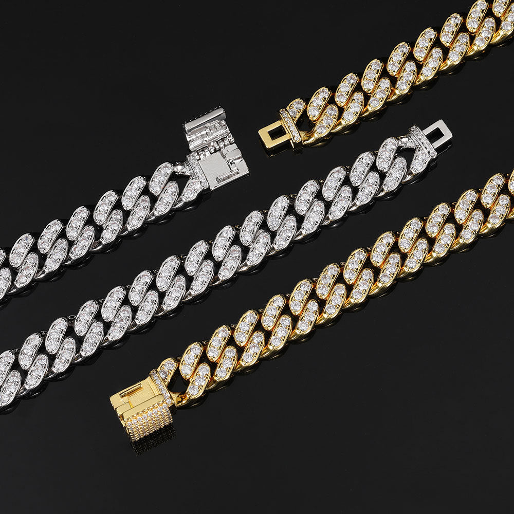 12MM SINGLE ROW ZIRCON CUBAN LINK BRACELET IN BLACK GOLD AND YELLOW GOLD